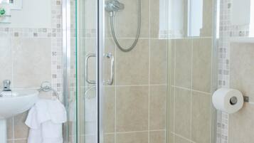 Combined shower/bathtub, hair dryer, towels, soap