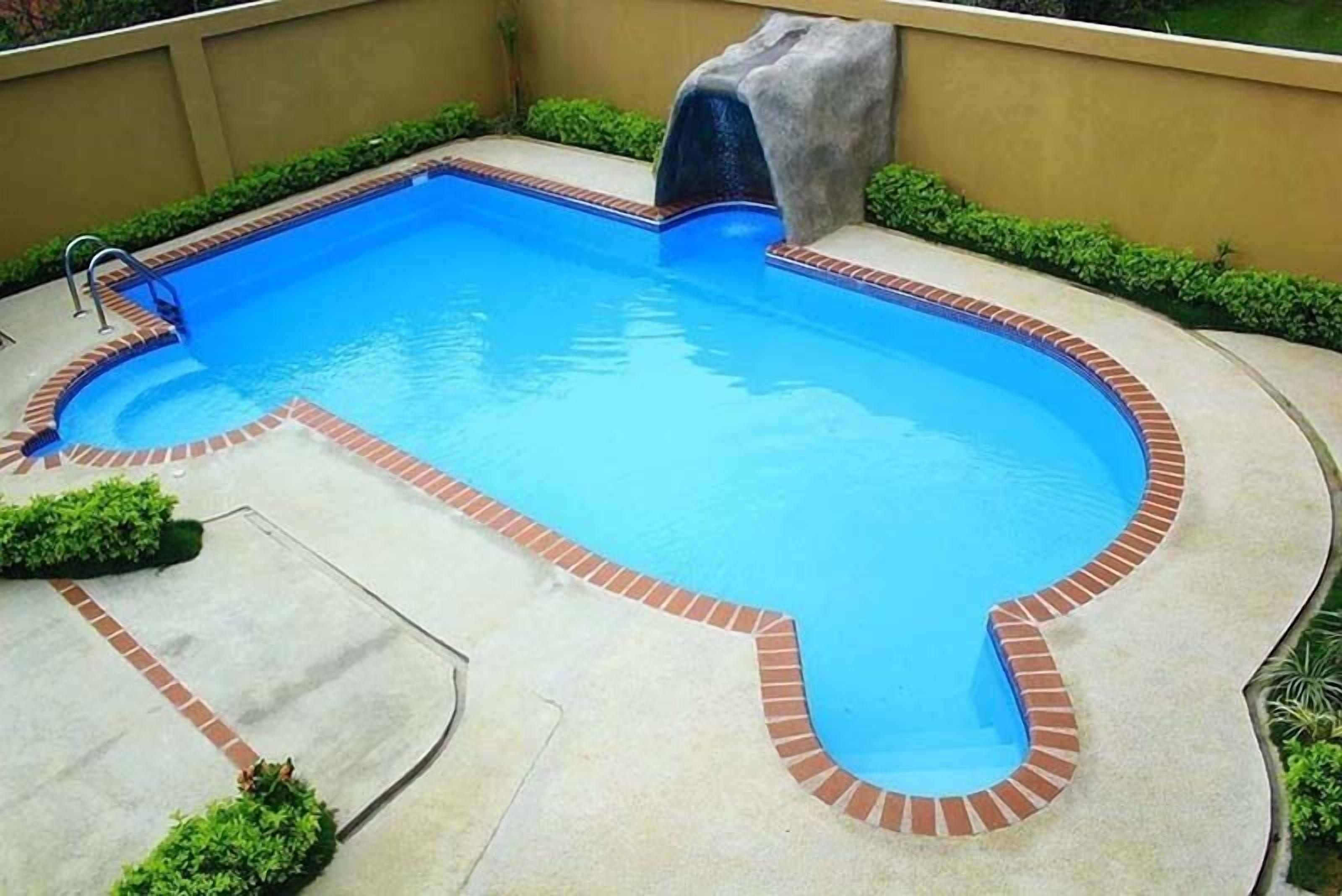 outdoor pool, open 7:30 am to 8:00 pm, pool loungers