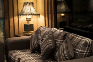 Deluxe Suite, 2 Double Beds | Living area