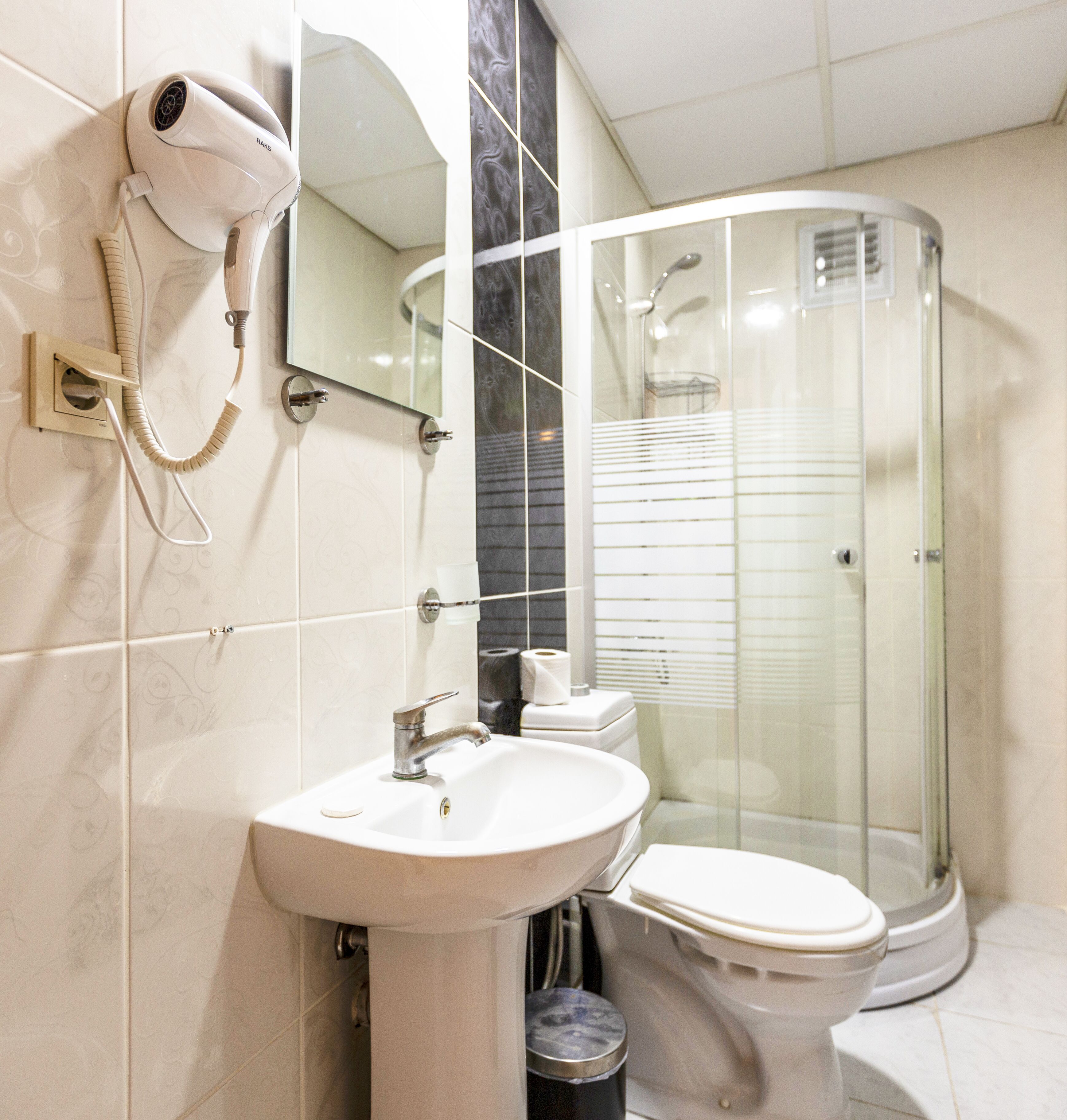 shower, free toiletries, hair dryer, slippers