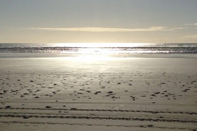 Modern bach located between the sea and bush in Orepuki