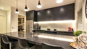 Oven, stovetop, dishwasher, coffee/tea maker