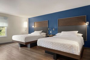 Desk, laptop workspace, blackout drapes, iron/ironing board