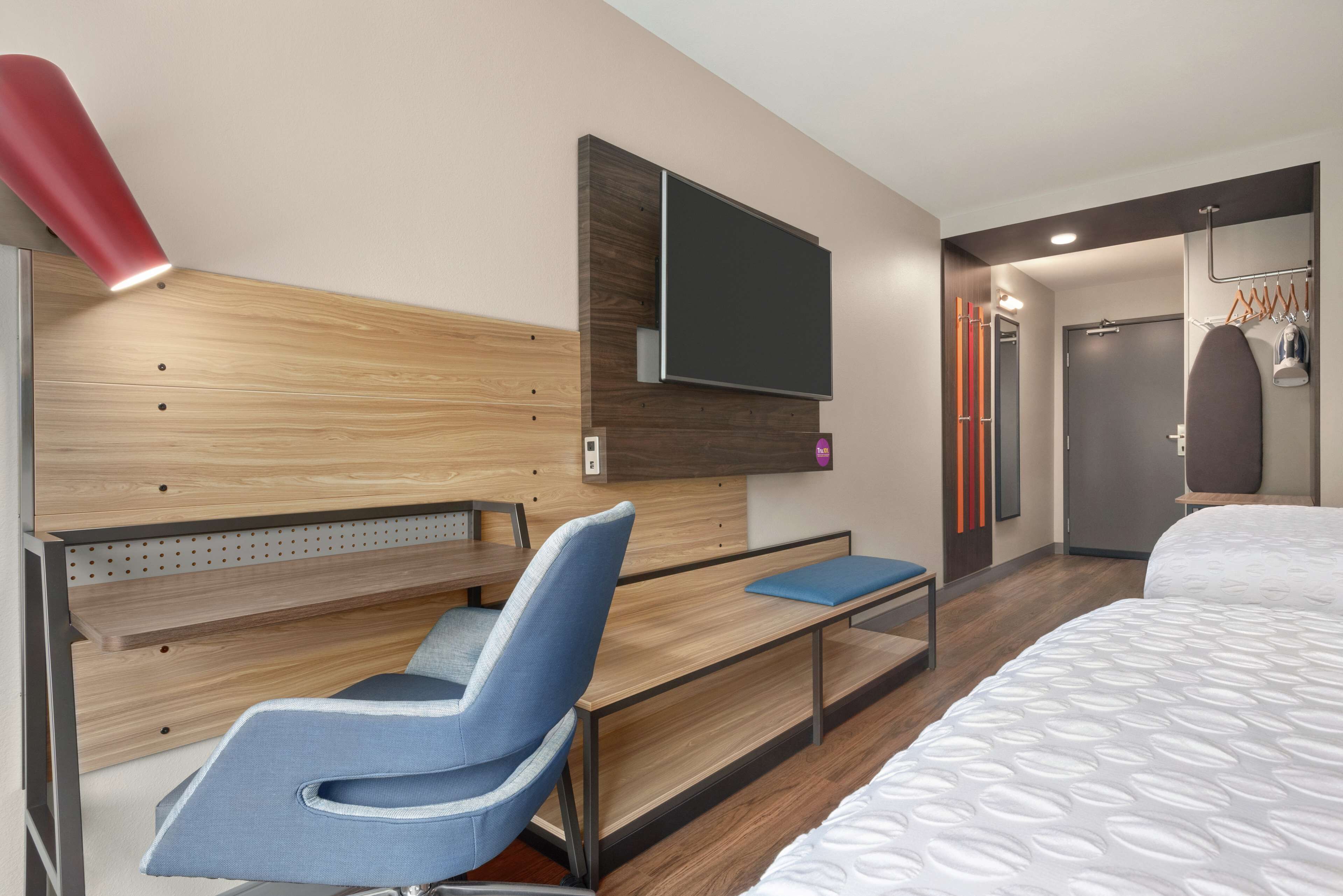 desk, laptop workspace, blackout curtains, iron/ironing board