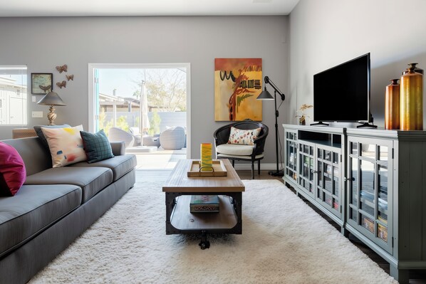 TV, fireplace, books, video library