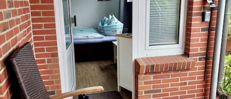 Iron/ironing board, travel crib, free WiFi, bed sheets