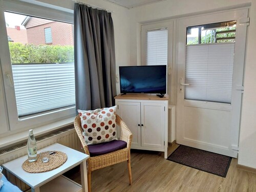 Daubs Inseloase – Apartment 4 mit Terrasse, tierfrei & strandnah