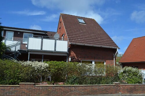 Daubs Inseloase – Apartment 4 mit Terrasse, tierfrei & strandnah