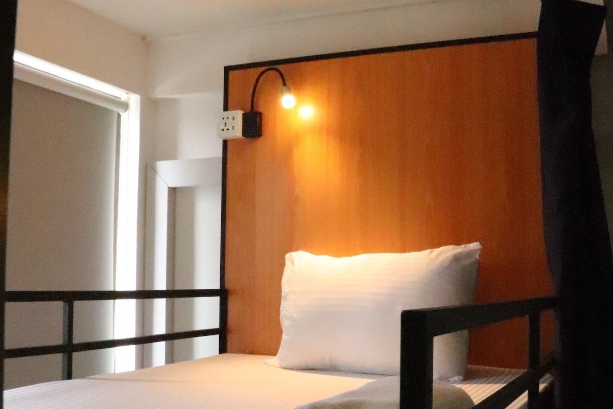 Premium bedding, blackout drapes, iron/ironing board (on request)