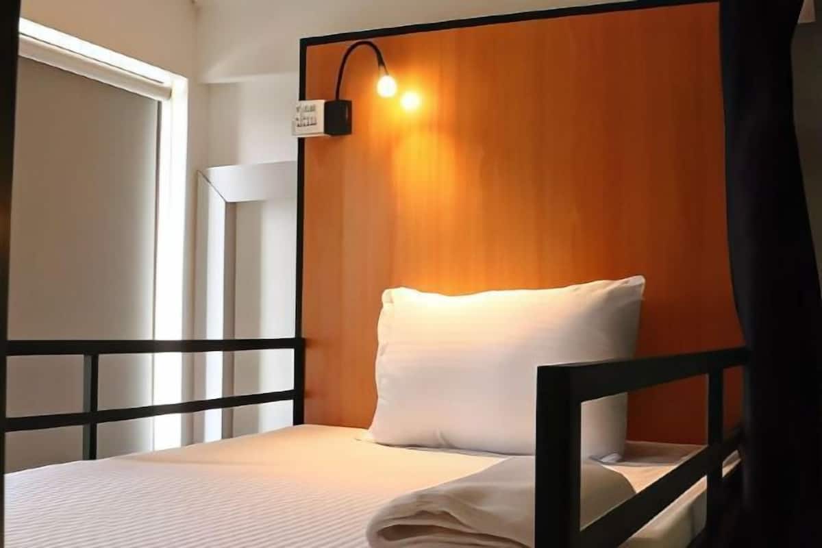 Premium bedding, blackout curtains, iron/ironing board, free WiFi