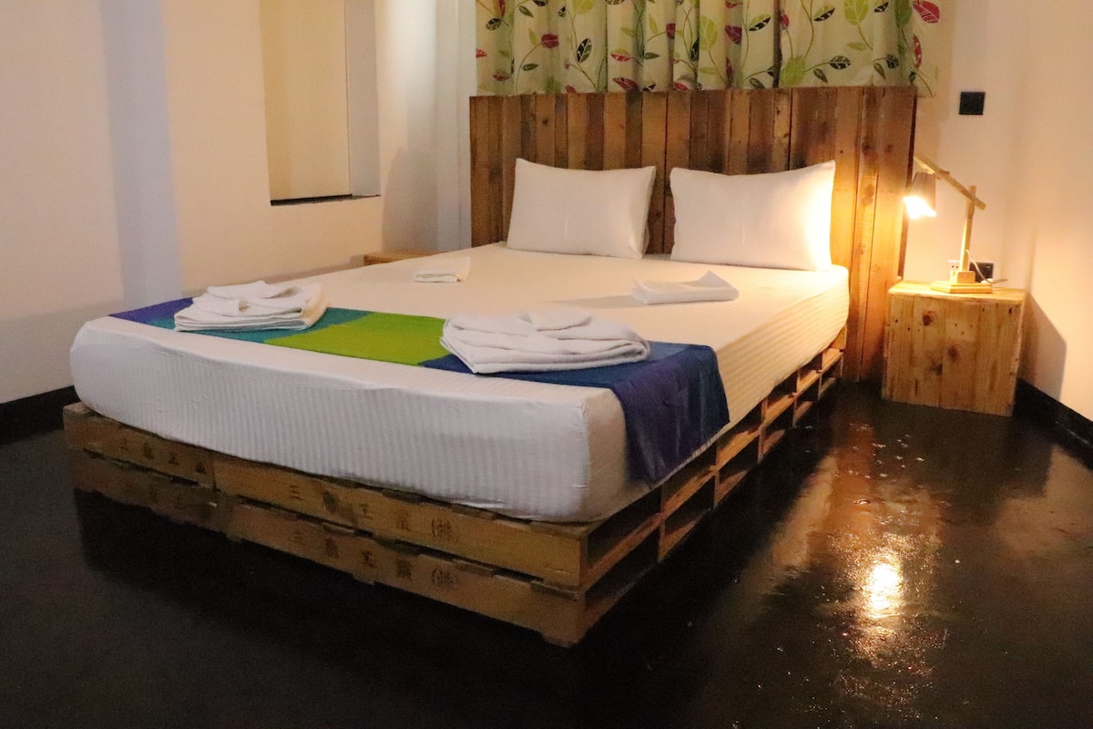Premium bedding, blackout curtains, iron/ironing board, free WiFi