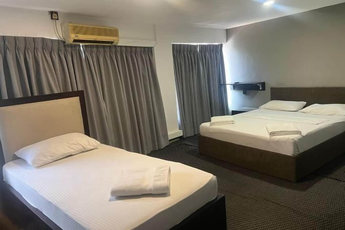 Premium bedding, blackout curtains, iron/ironing board, free WiFi