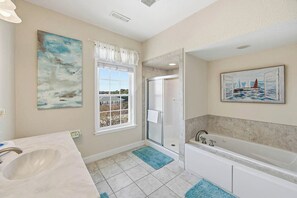 Combined shower/tub, towels, soap, toilet paper