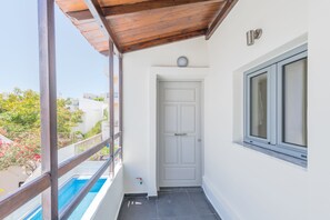 Family Apartment, 1 Bedroom, Non Smoking, Partial Sea View | Terrace/patio