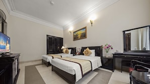 Habitación con 2 camas individuales, vista al jardín