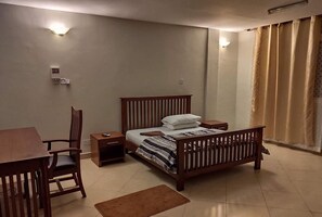 Desk, blackout drapes, free WiFi, bed sheets - Ambiere House (Mtwara)