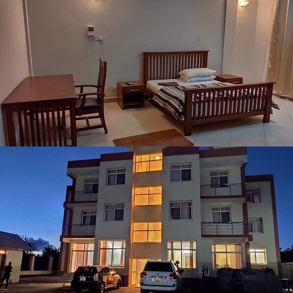 Desk, blackout drapes, free WiFi, bed sheets - Ambiere House (Mtwara)