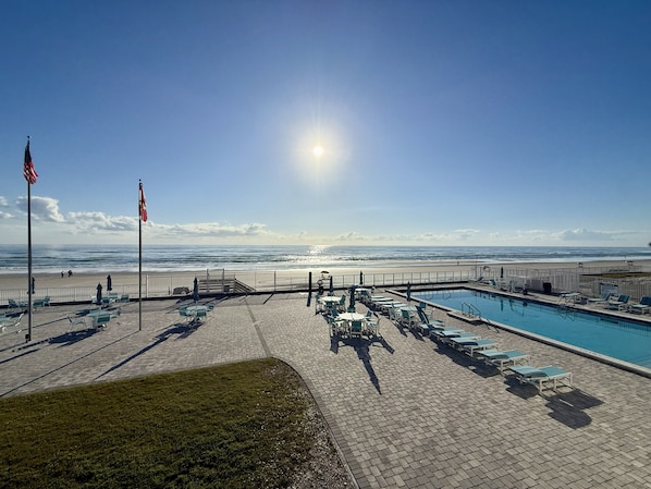 Outdoor pool, a heated pool - An adorable, direct oceanfront front studio with a large private balcony. (Daytona Beach)
