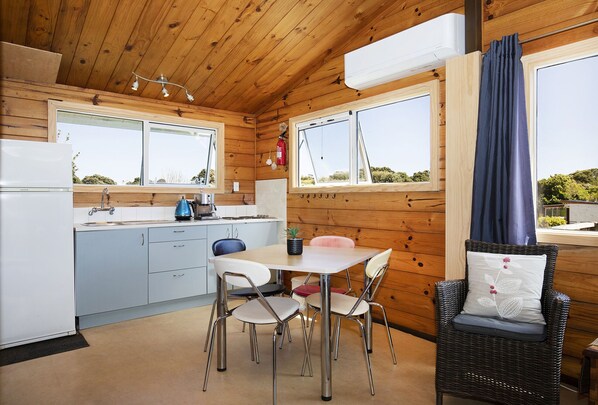 Fridge, microwave, stovetop, coffee/tea maker