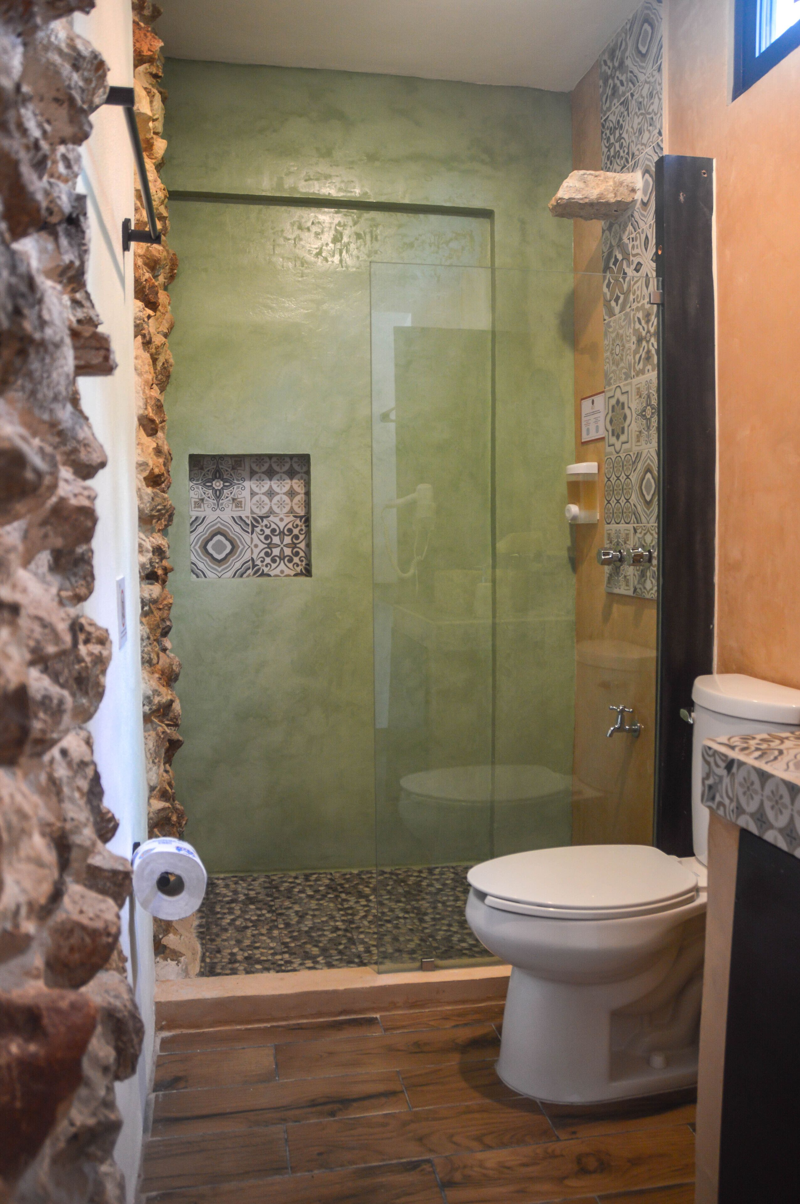 junior suite, 1 king bed, annex building | bathroom | shower, designer toiletries, hair dryer, towels