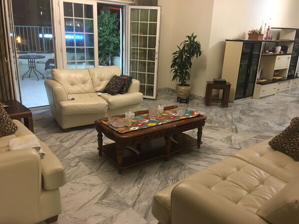 Loft, 4 Bedrooms | Living area | Flat-screen TV - Loft (Amman)