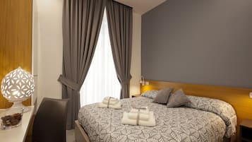 Premium bedding, down duvets, memory-foam beds, desk