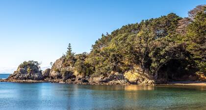 Family cottage at Enclosure Bay - 4 bedrooms, 2 bathrooms, beachfront.