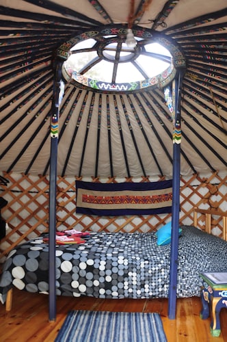 Small blue yurt at Cabot Shores Wilderness Resort