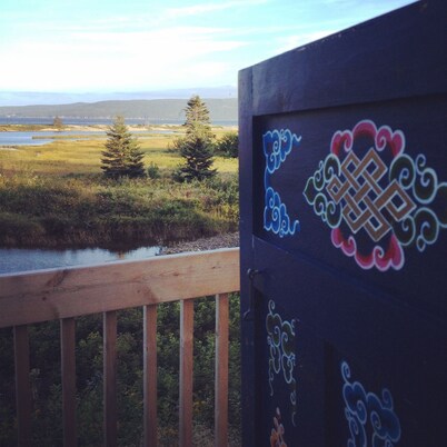 Small blue yurt at Cabot Shores Wilderness Resort
