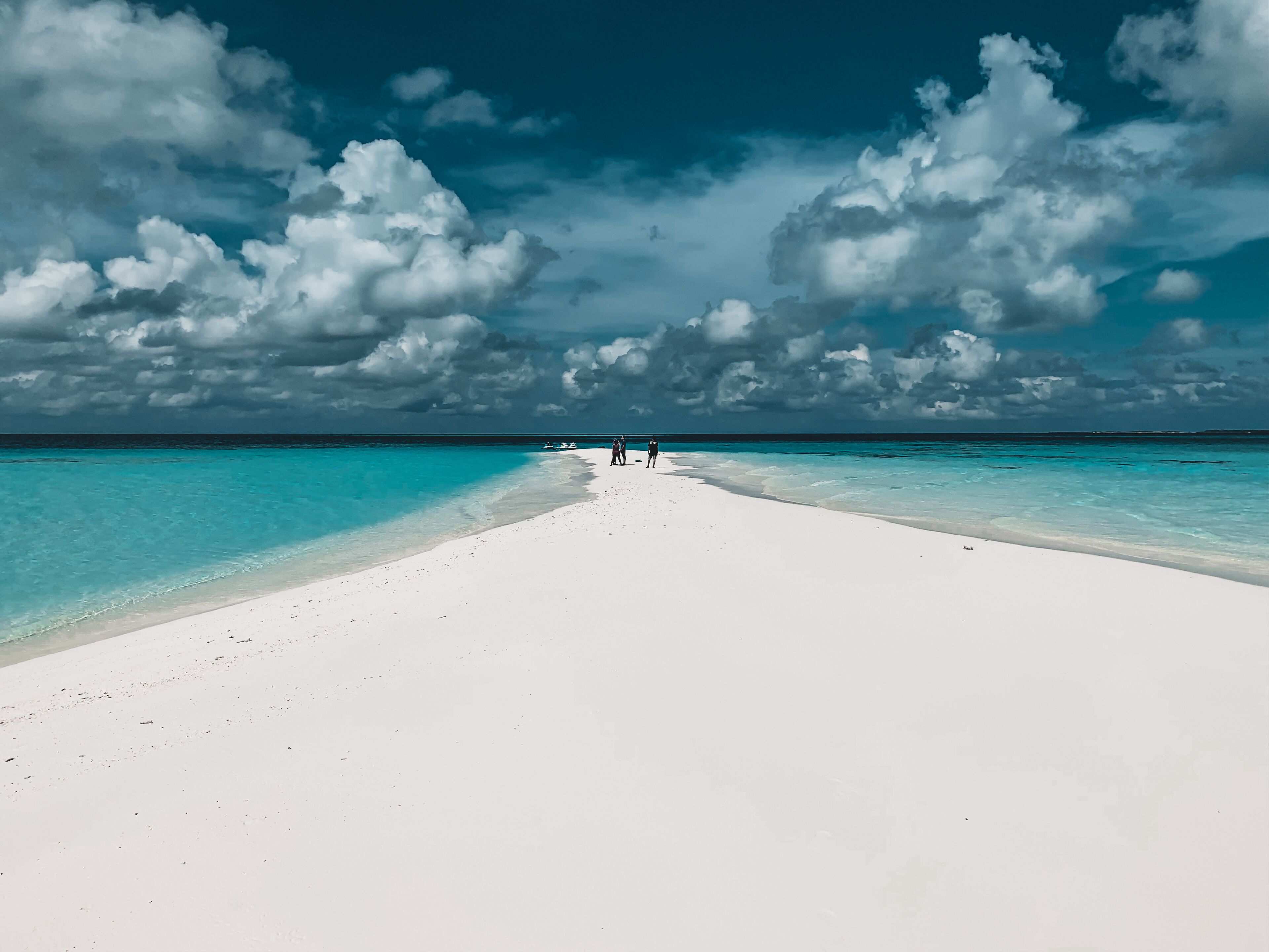 white sand, beach towels