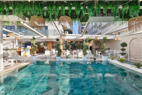 Seasonal outdoor pool, open 8:00 AM to 5:30 PM, sun loungers