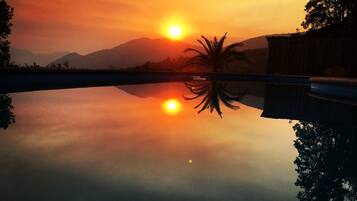Seasonal outdoor pool, pool umbrellas, pool loungers