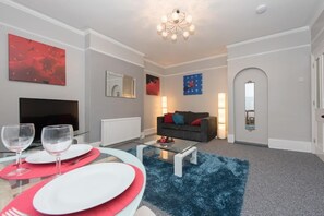 Apartamento | Área de estar | TV de tela plana