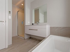 Bathtub, hair dryer