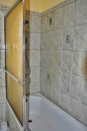 Classic Villa | Bathroom | Rainfall showerhead, towels, soap, shampoo