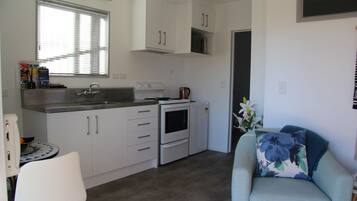 Apartemen, 1 kamar tidur | Area keluarga | TV layar datar