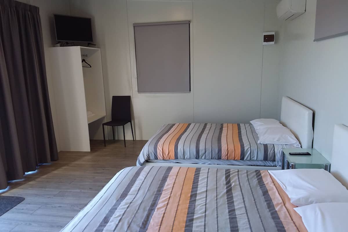 Deluxe-Doppel- oder -Zweibettzimmer | Verdunkelungsvorhänge, schallisolierte Zimmer, Bügeleisen/Bügelbrett