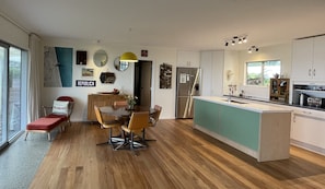 Dining - Beachfront Bach, moments to ocean, breathtaking views, family friendly, Wi-Fi (Patons Rock)
