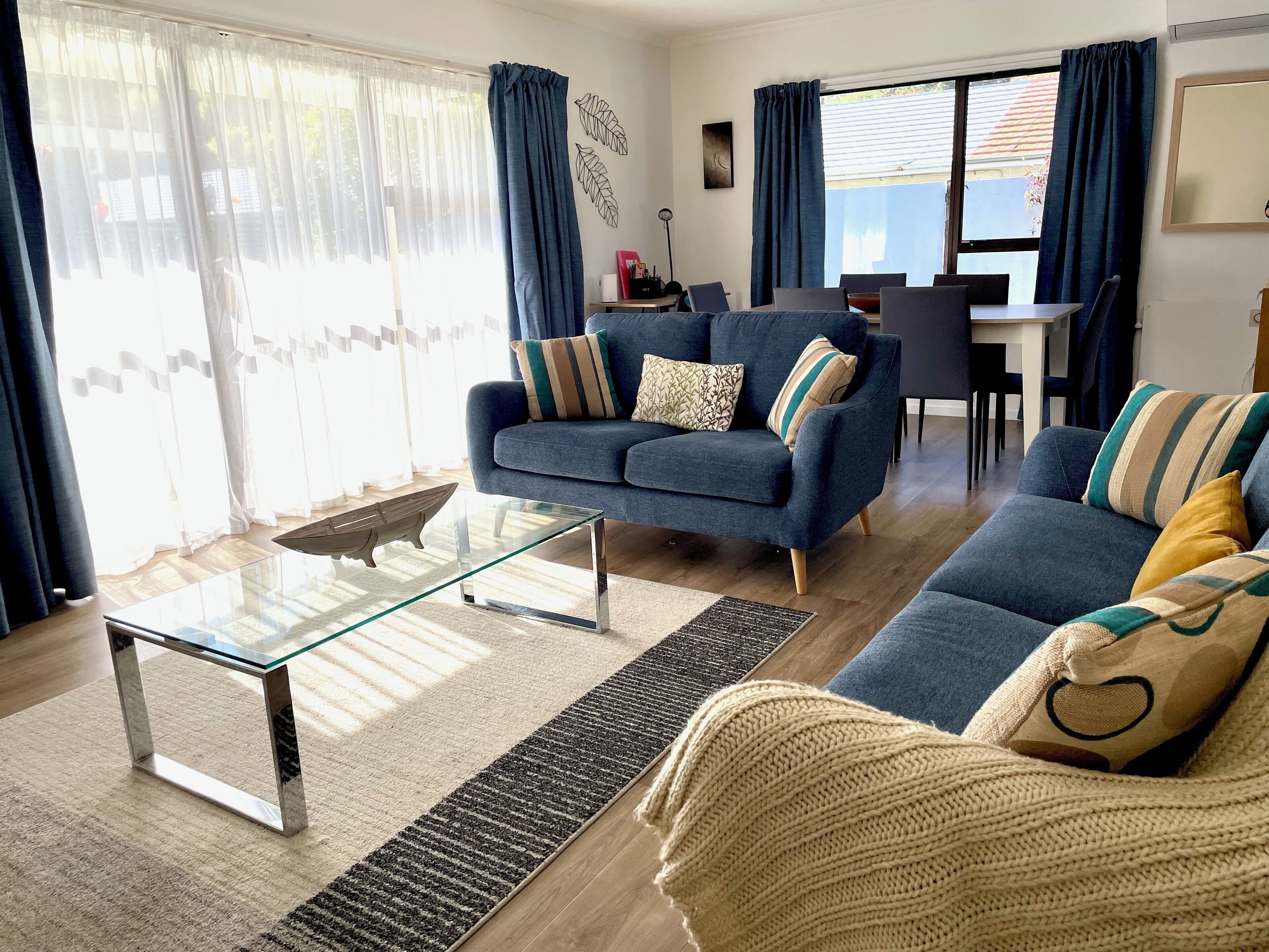 Flat-screen TV, DVD player, books, video library