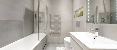 Hair dryer, towels, soap, shampoo