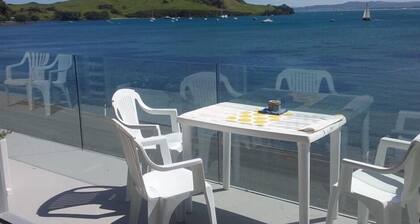 "Beside The Sea."More than an apartment! Absolute waterfront. Swim steps away.
