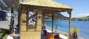 "Beside The Sea."More than an apartment! Absolute waterfront. Swim steps away.