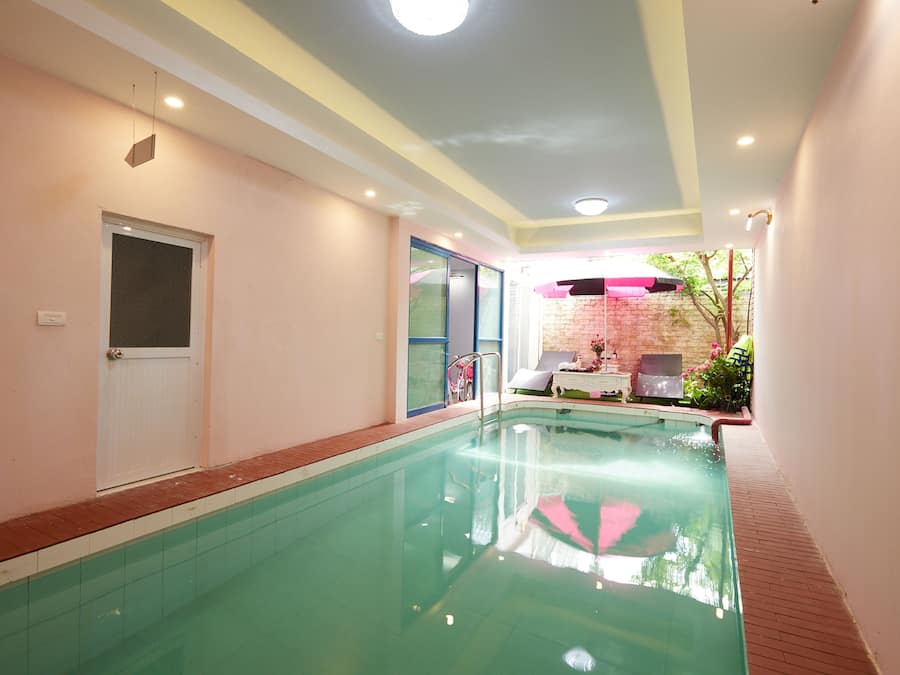 Indoor pool, pool umbrellas, sun loungers