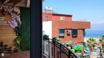 Family Quadruple Room, Balcony, Partial Ocean View | Balcony view