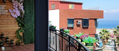 Family Quadruple Room, Balcony, Partial Ocean View | Balcony view