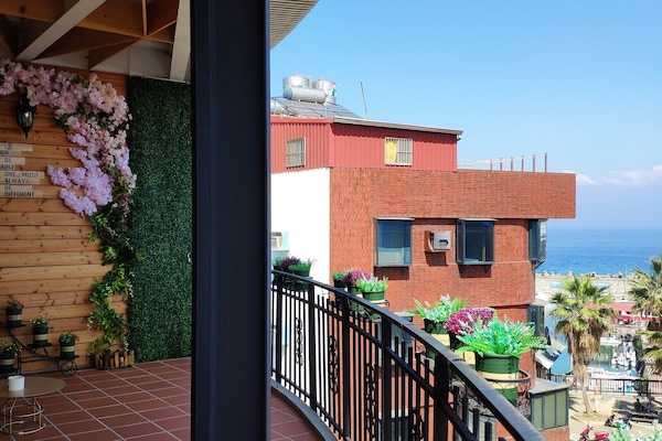 Family Quadruple Room, Balcony, Partial Ocean View | Balcony view