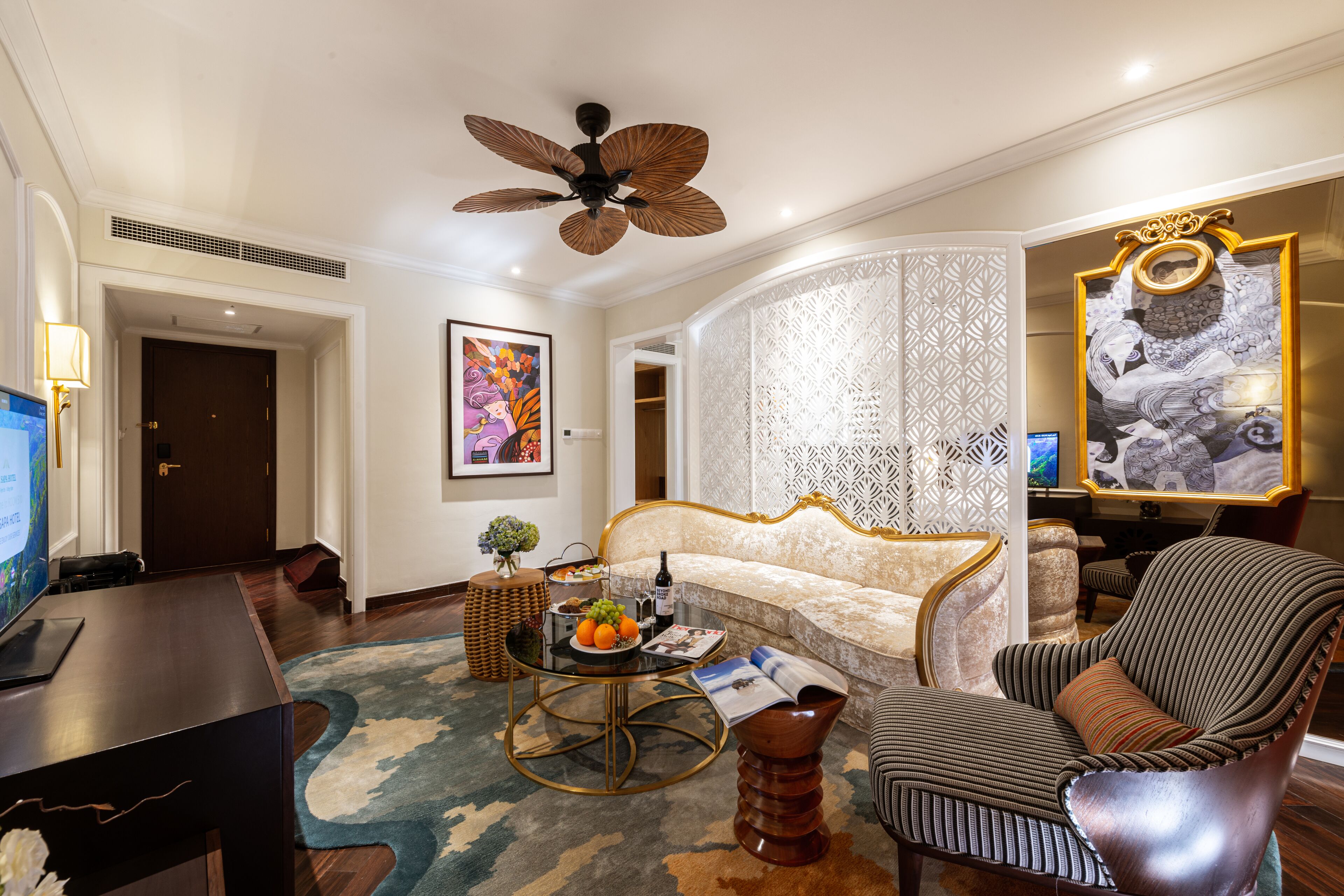 suite room | living area | 48-inch flat-screen tv with cable channels, tv, books