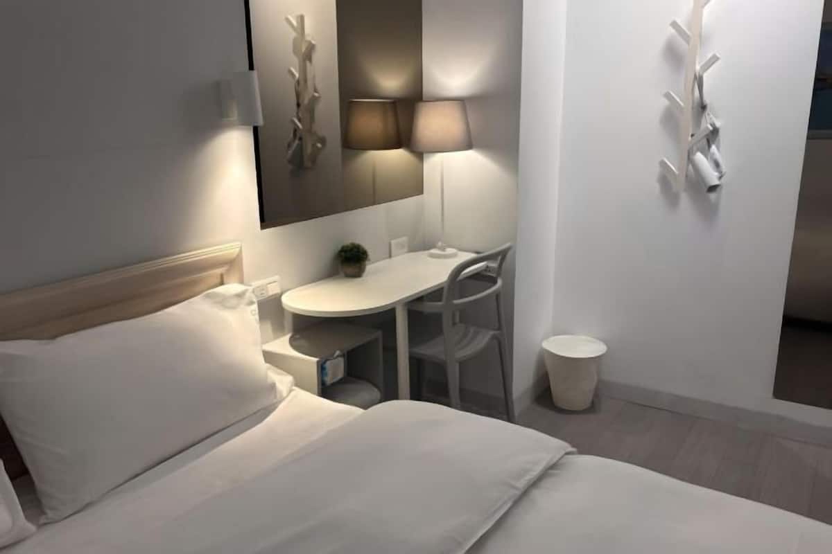 Down duvets, desk, blackout curtains, free WiFi