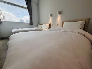 Triple Room with Shared Bathroom | Down comforters, desk, blackout drapes, free WiFi - Bluewater Hotel Taoyuan (Taoyuan City)