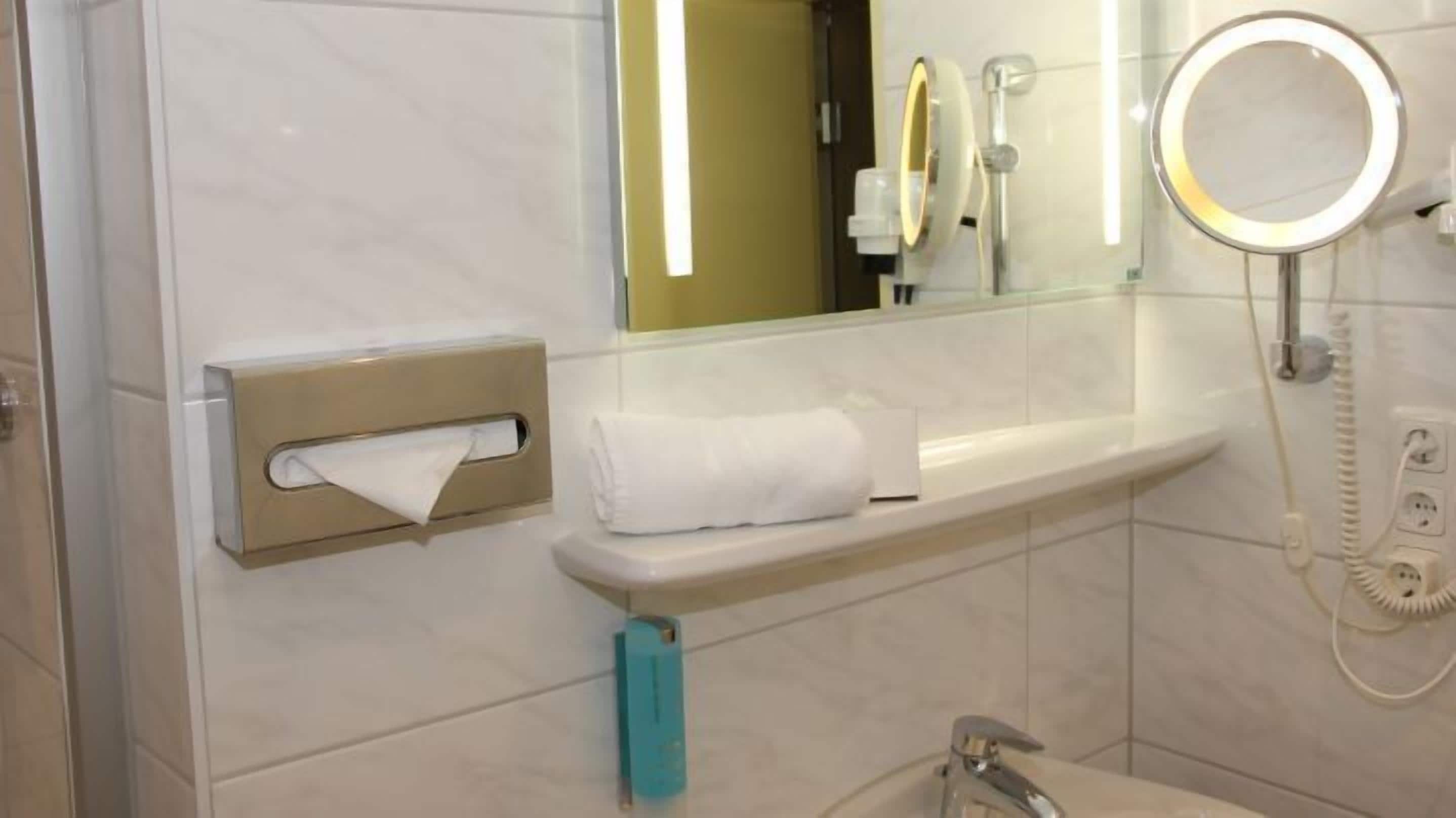 combined shower/bathtub, hair dryer, towels, soap